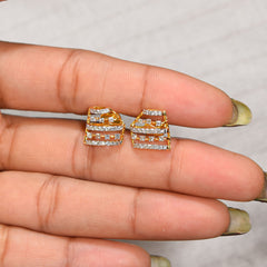 Pair of sleek dual bar gold stud earrings in yellow gold polish